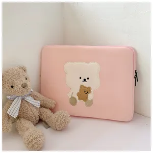 Cute pink laptop sleeve featuring lovely embroidered bear design, soft and protective inner case.