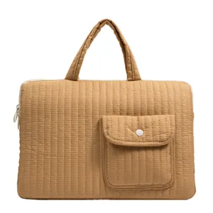 Quilted laptop handbag for women, lightweight solid color computer sleeve with front pocket.
