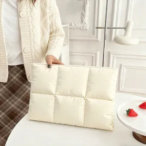 Puffy quilted laptop sleeve beige 14 inch commuter computer bag soft minimalist design main view