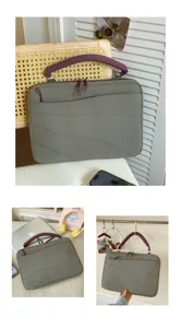 Detail view of shockproof laptop sleeve with purple handle and wave quilted design for tablet.