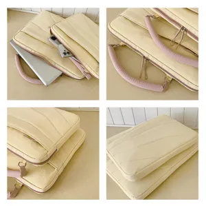 Detailed view of a chic beige laptop sleeve with pink handles and secure zipper pocket.