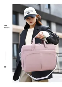 Stylish pink laptop bag with large capacity, durable handles and adjustable shoulder strap.