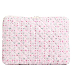 Pink quilted laptop sleeve with cute strawberry floral pattern and dual zippers for 13-15 inch