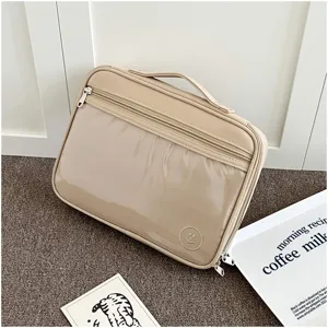 Bolsa de almacenamiento beige minimalista para portátil con ventana frontal transparente y asa.