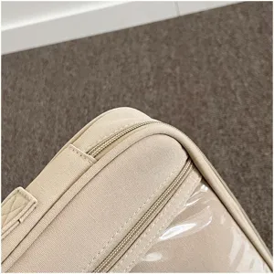 Funda para portátil beige bolsa tablet detalle, ventana transparente, cremallera resistente.