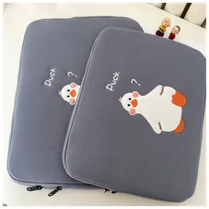 Cute grey laptop sleeve with adorable duck embroidery, stylish tablet inner bag for daily use.
