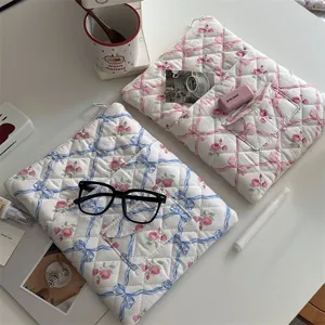 Korean aesthetic floral quilted laptop bag stylish tablet storage sleeve for women daily use.