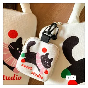 Korean style cute cat print laptop sleeve and matching pouch set for ipad storage.