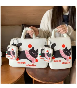 Cute black cat canvas laptop bag detail, portable tablet storage handbag with matching pouch.
