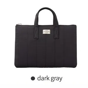 Dark gray quilted laptop bag for 11-13 inch tablet and notebook with dual handles.