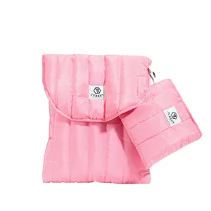 Pink quilted laptop sleeve set with matching pouch, stylish protective case for daily use.