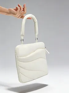 Lightweight puffy cloud laptop sleeve, minimalist quilted handbag for daily commute and office use.