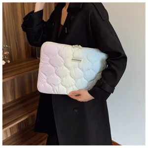 Quilted gradient laptop sleeve detail view, cute aesthetic tablet case for daily protection.