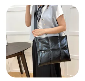Puffy black messenger laptop bag, soft space cotton shoulder bag for 15.6 inch notebook.