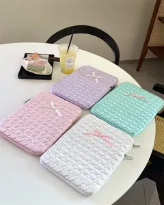 Quilted heart embroidered tablet sleeve with cute bow detail, aesthetic laptop storage bag.