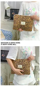 Leopard print iPad sleeve cute laptop bag Y2K aesthetic tablet case with secure zipper closure.