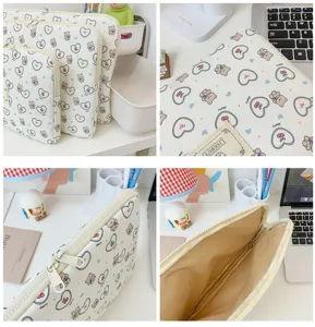 Cute bear heart print laptop sleeve detail, canvas tablet bag with zipper and soft lining.