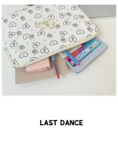 Cute cartoon bear pattern laptop sleeve detail, soft protective bag interior with spacious storage.