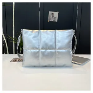 Silver padded laptop shoulder bag detail, quilted design, soft space cotton messenger bag.