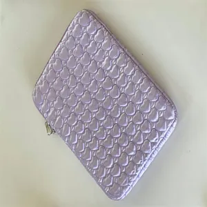Quilted heart pattern iPad laptop sleeve, cute purple tablet storage bag with zipper closure.
