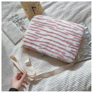 Fluffy pink tiger stripe shoulder bag plush tablet sleeve soft aesthetic laptop bag cute daily use.