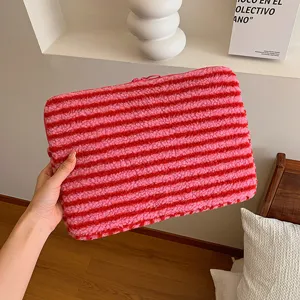 Fluffy fleece striped laptop sleeve and tablet storage bag, soft pink design for daily use.