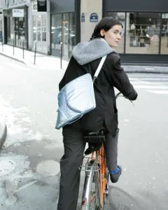 Stylish metallic puffy 14-inch laptop bag with unique origami fold design for daily commute.