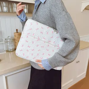 Housse d'ordinateur matelassée avec nœud et fermeture éclair perle, style coréen.