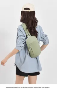 Outdoor casual chest bag for men and women, stylish light green crossbody travel backpack.