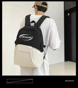 Korean style black white contrast backpack, casual student schoolbag and travel laptop bag detail view.