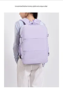 Detailed view of the large capacity travel backpack in light purple, multiple compartments.