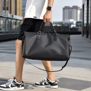 Large capacity black gym duffel bag for fitness travel sports and outdoor daily use.