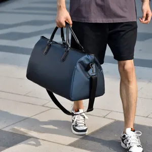 Large capacity solid color travel duffel bag for sports, gym, outdoor and weekend trips.