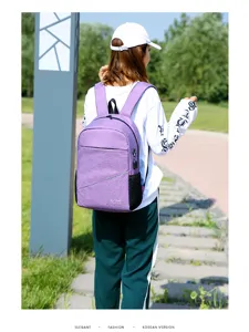 Casual purple backpack for travel and daily use with spacious compartments and pockets.