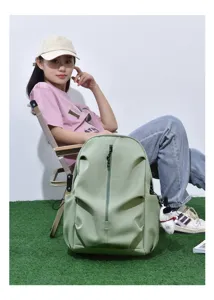 Casual large capacity solid color backpack with vertical zipper for daily use and travel.
