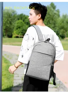 Grey outdoor travel laptop backpack with USB charging port and multi-pocket daily detail view.