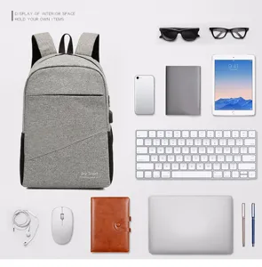 Grey casual laptop backpack with large capacity and multi-pocket interior storage design