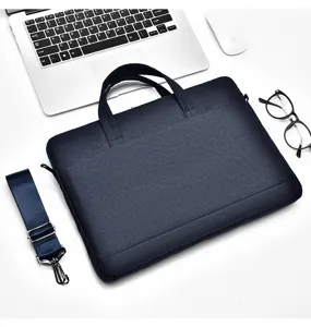 Dunkelblaue Laptoptasche, schicke Business-Aktentasche mit Griff und Schultergurt fuer Arbeit.