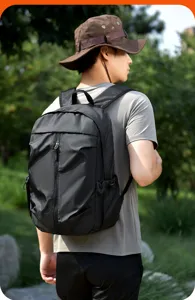 Detailed view of black waterproof outdoor backpack, highlighting large capacity and durable design.