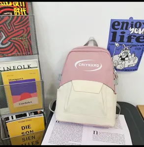 Pink and off-white casual school backpack, stylish travel daypack designed for daily student use.