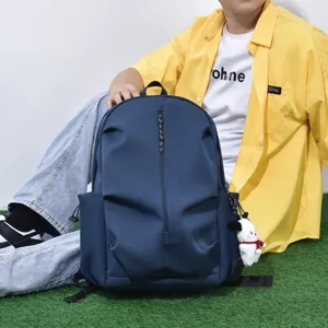 Trendy casual backpack for men and women, large capacity solid color school bag for daily use.