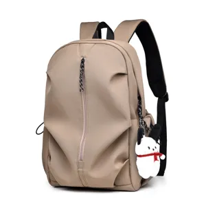 Casual khaki backpack with cute plush charm, lightweight large capacity daily school bag for men