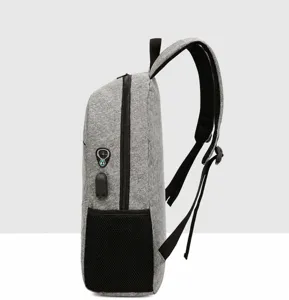 Gray business casual laptop backpack with USB charging port and side mesh pockets for daily travel.