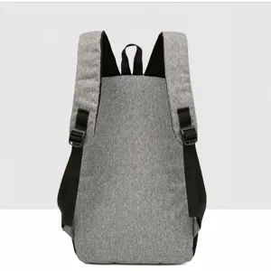 Gray casual travel backpack detail view, large capacity school book bag for daily use.