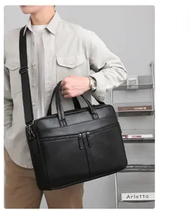 Men's black leather business briefcase, large capacity multi-layer commuter computer bag.
