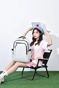 Detail view of the stylish grid backpack in daily commuting scene, showcasing large capacity.