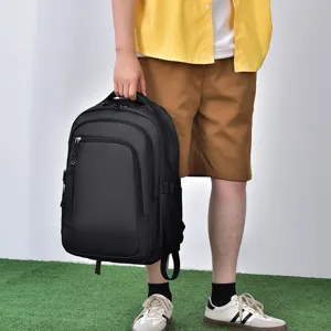 Stylish black grid backpack for men and women, large capacity business laptop bag for travel.