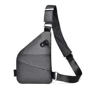 Detail view of the stylish grey waterproof crossbody chest bag with durable strap and metal hardware.