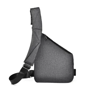 Detail shot of the dark grey minimalist crossbody sling bag showing fabric texture and zipper.