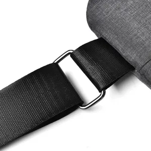 Close-up detail of the durable nylon strap and metal buckle on the casual men's chest bag.